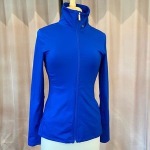 Under Armour blue fitted zip jacket with pockets size M